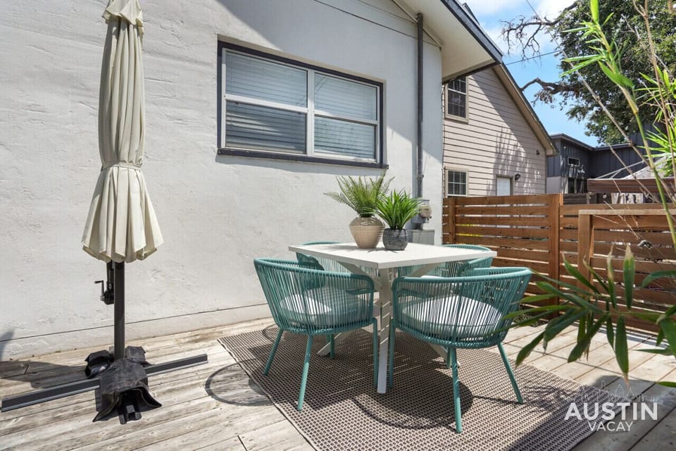 Dining space on the patio with solar light umbrella