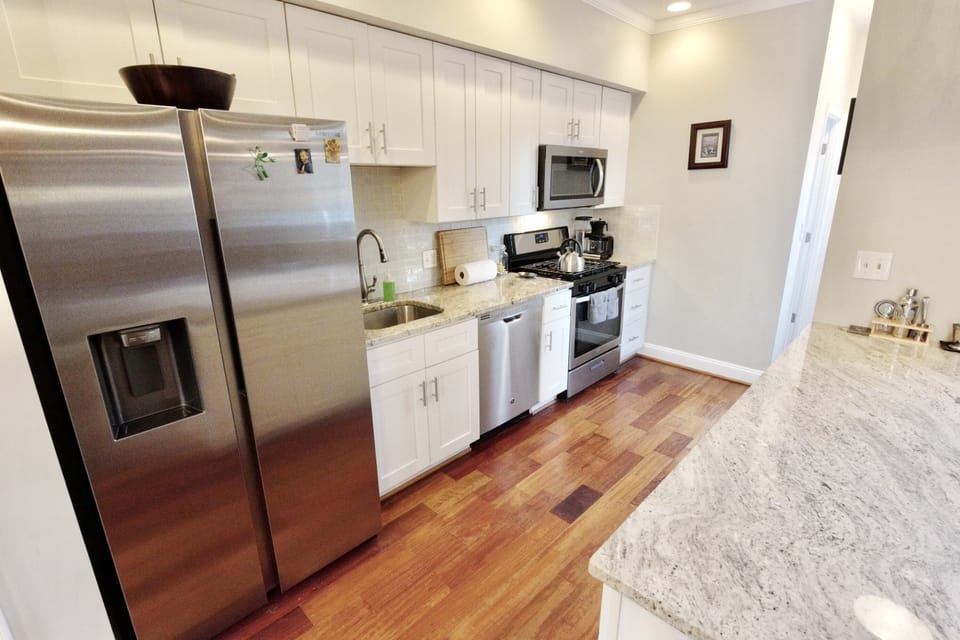 Full sized appliances in gourmet kitchen