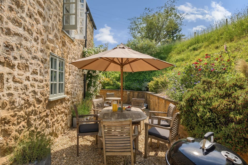 The Old Chapel, Stoke Abbott: The dining furniture and barbecue