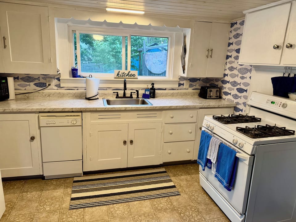 Our updated kitchen features all the comforts of home, including a dishwasher :) 