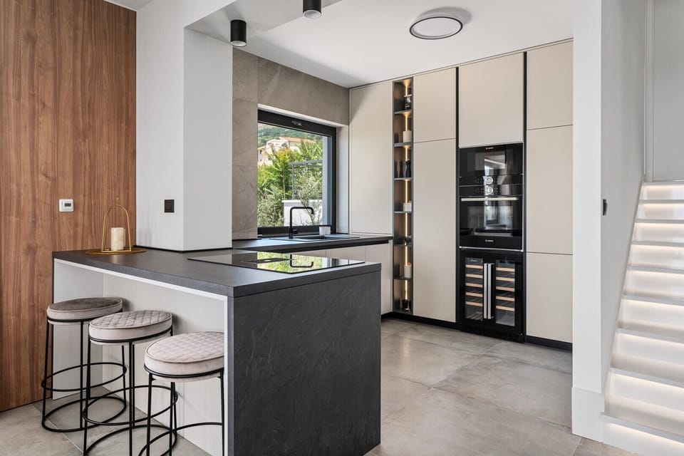 Villa with a chick tone, contemporary architecture, and high-quality furnishings.