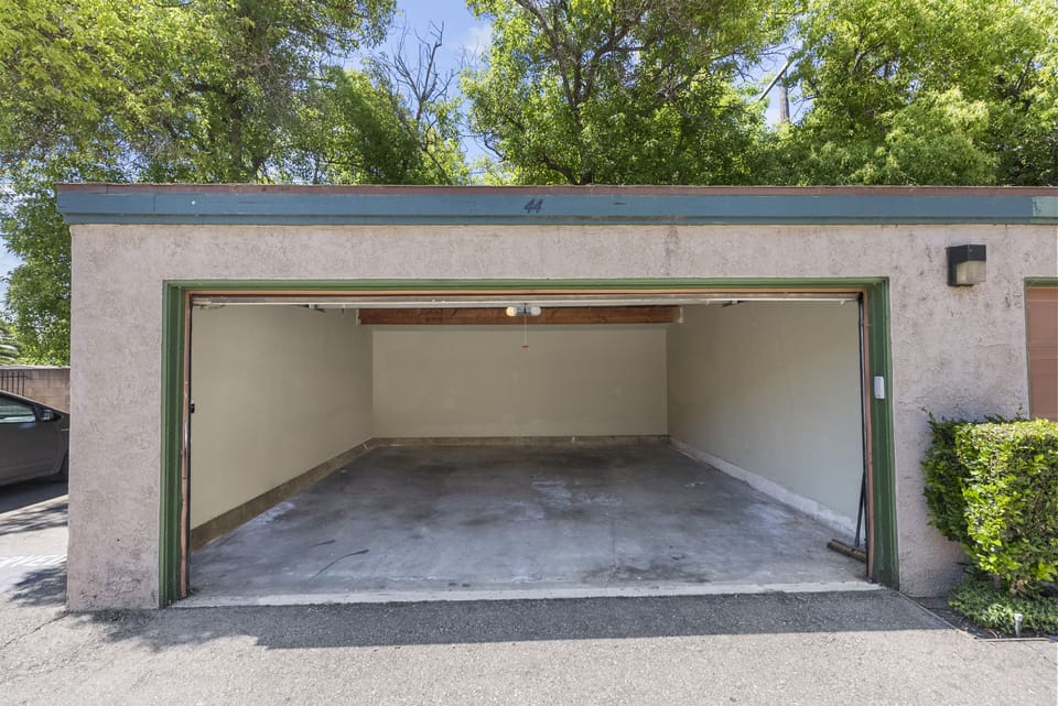 1 space in detached garage available (visitor surface parking also available)