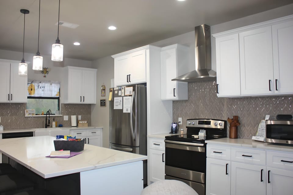Full kitchen with oven, stove, refrigerator, freezer, dishwasher, microwave, etc