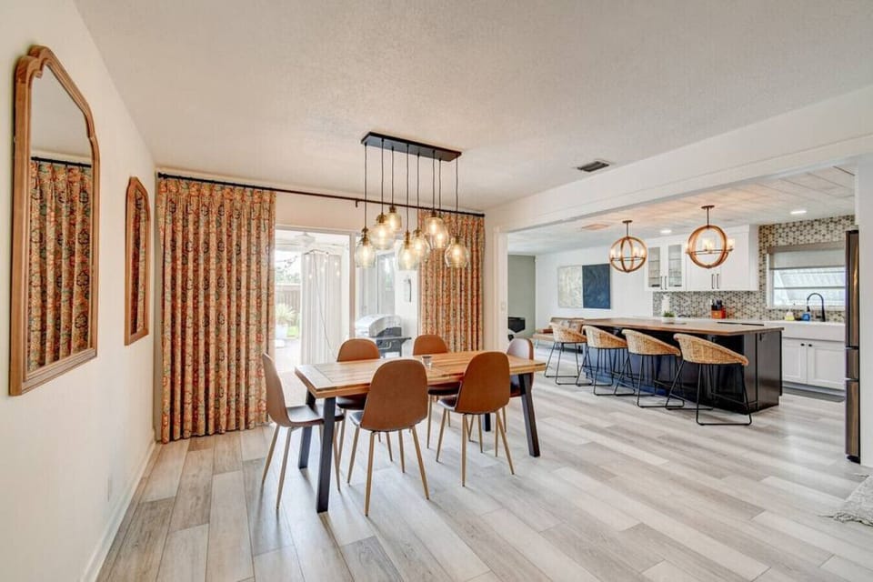 Imagine lingering over laughter and conversation in this inviting dining space. Ready for a cozy dinner party with friends and family.