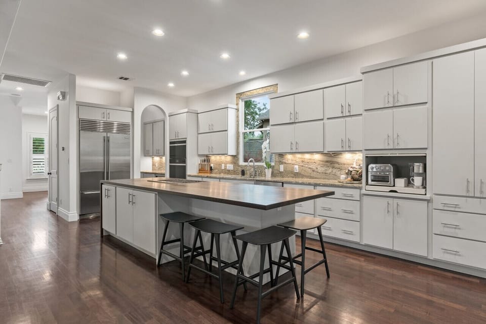 1 of 2 giant chef`s kitchen with commercial appliances and open concept design