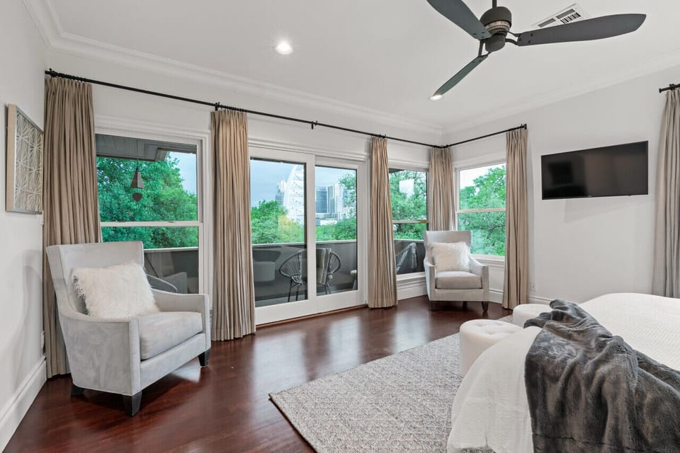 Primary King Bedroom # 2 with Ensuite Bathroom and downtown views