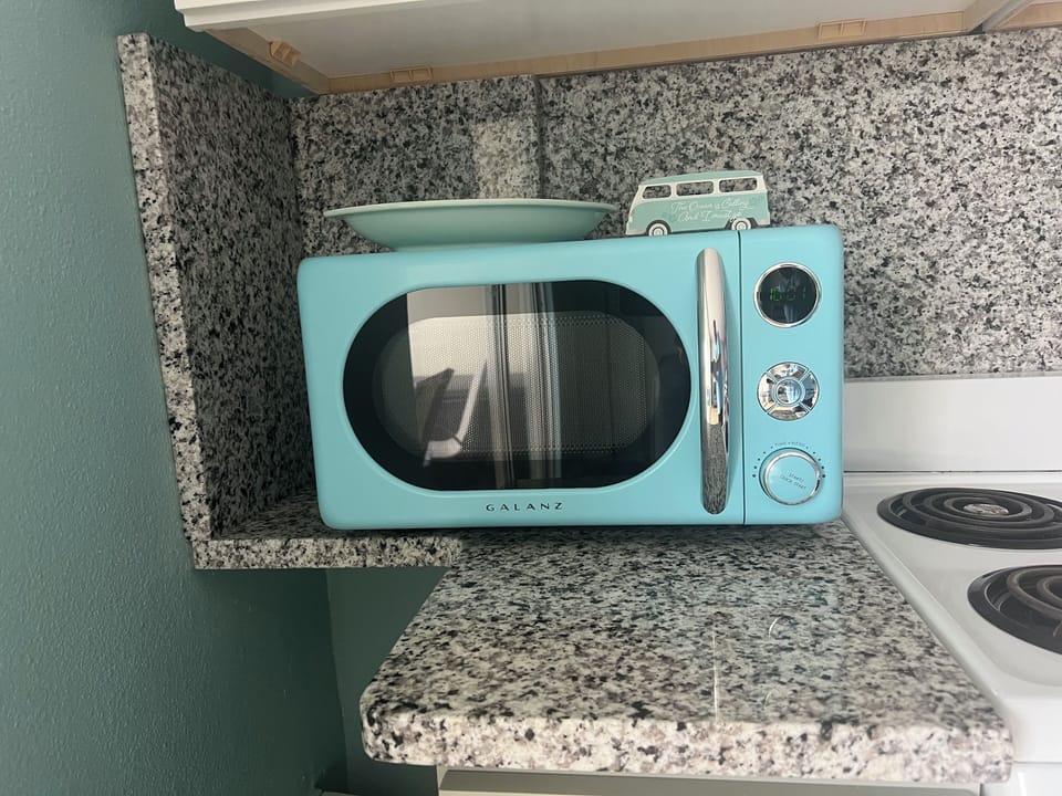 Retro style microwave adds fun beach charm to the kitchen.