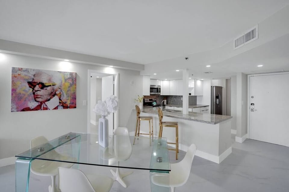 Dining area for 4, fully equipped kitchen counter seating for 2, washer/dryer