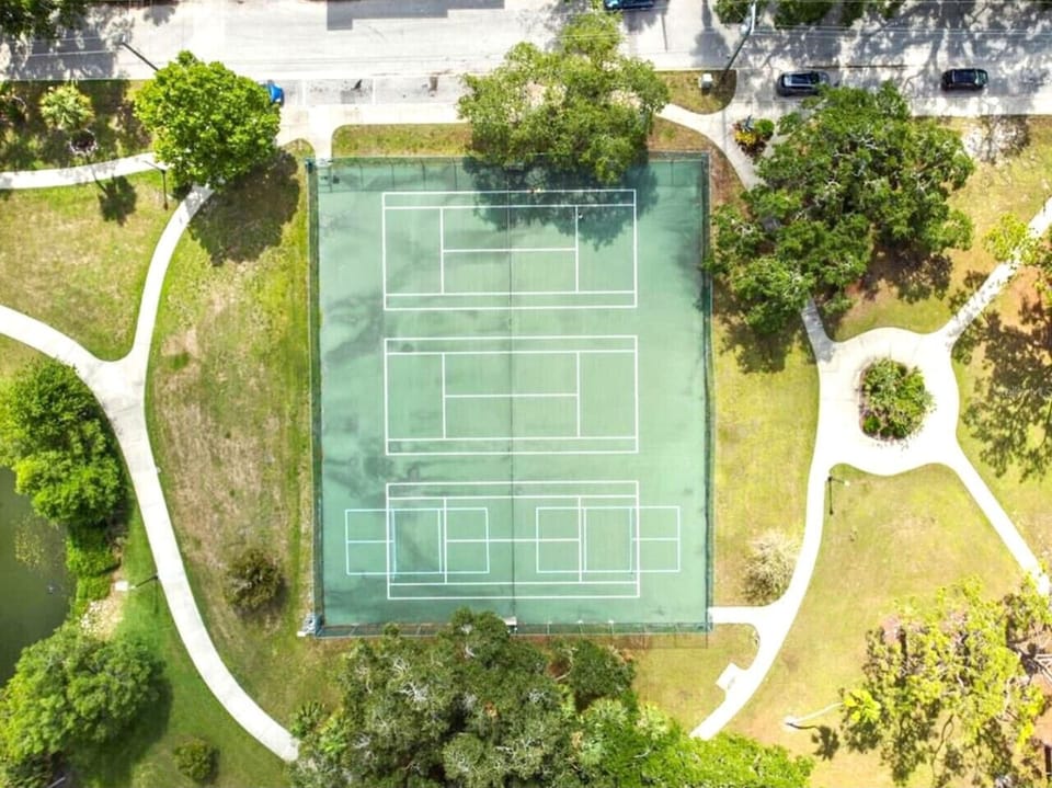Tennis and Pickleball Courts across the street in the 10 Acre Park