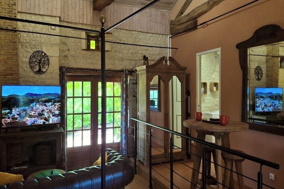 Patios on three sides, overlooking the gardens