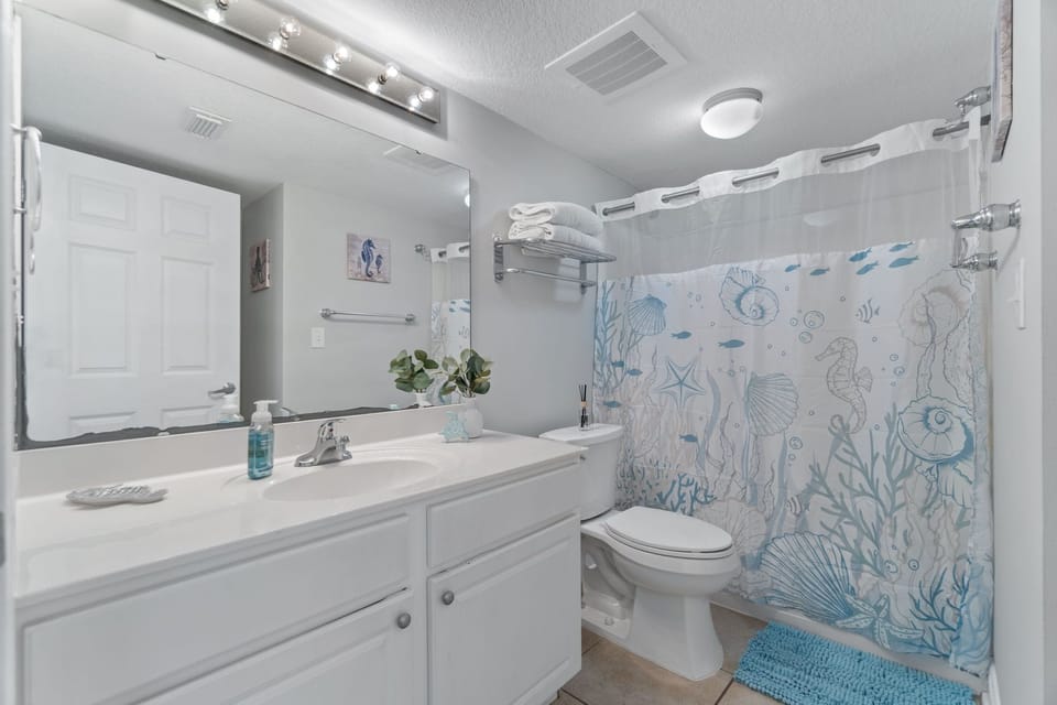 Guest bathroom with private entrance to guest bedroom.