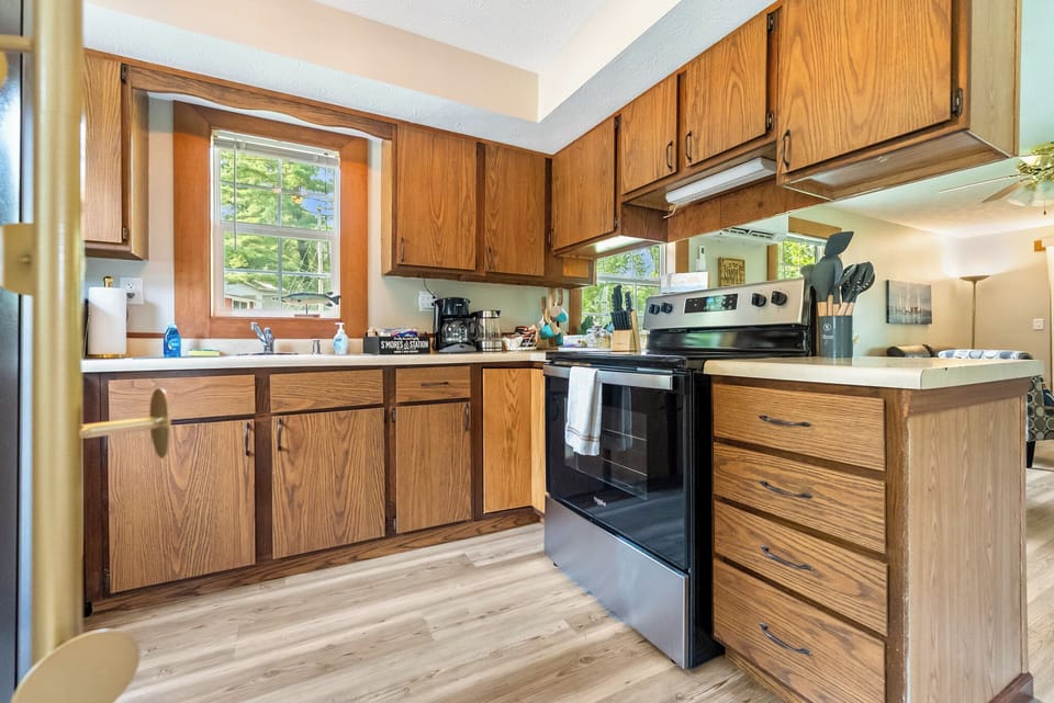 Full kitchen with stainless dishwasher