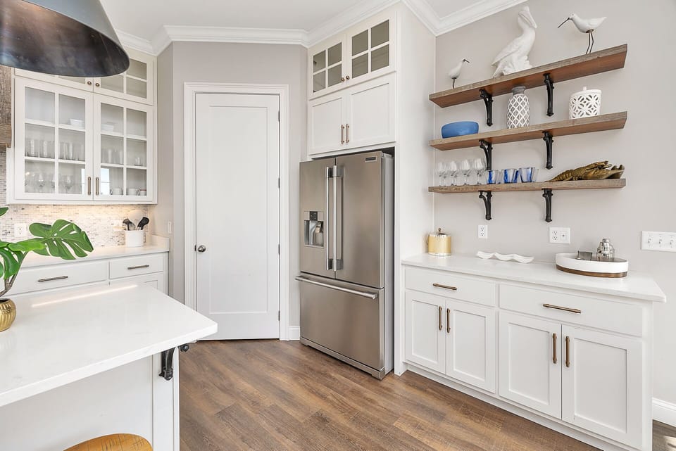 Chef's kitchen with a bar area
