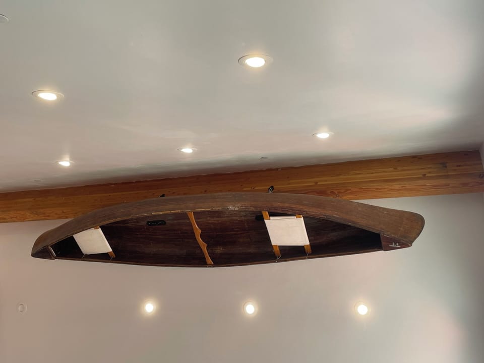 Yup! That’s a canoe “chandelier” over the great room!