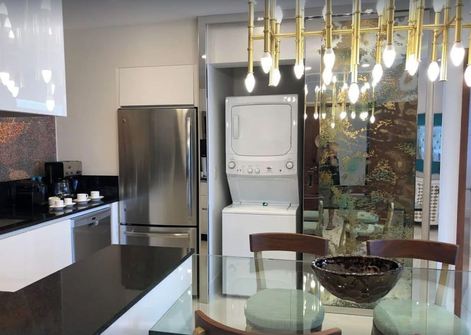 Full size fridge and in suite washer/dryer