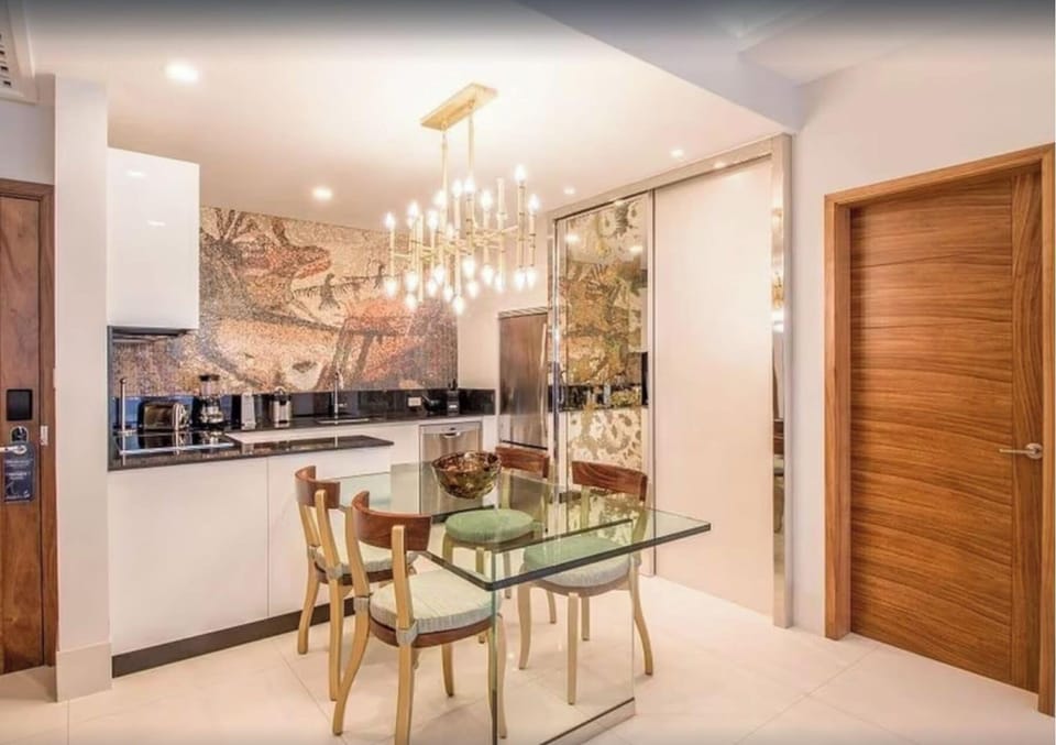 Full kitchen with coffee maker, espresso, microwave, and more