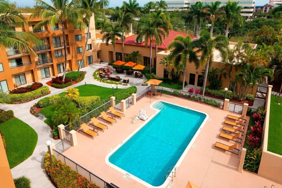 Soak up sunshine by the sparkling pool with loungers.