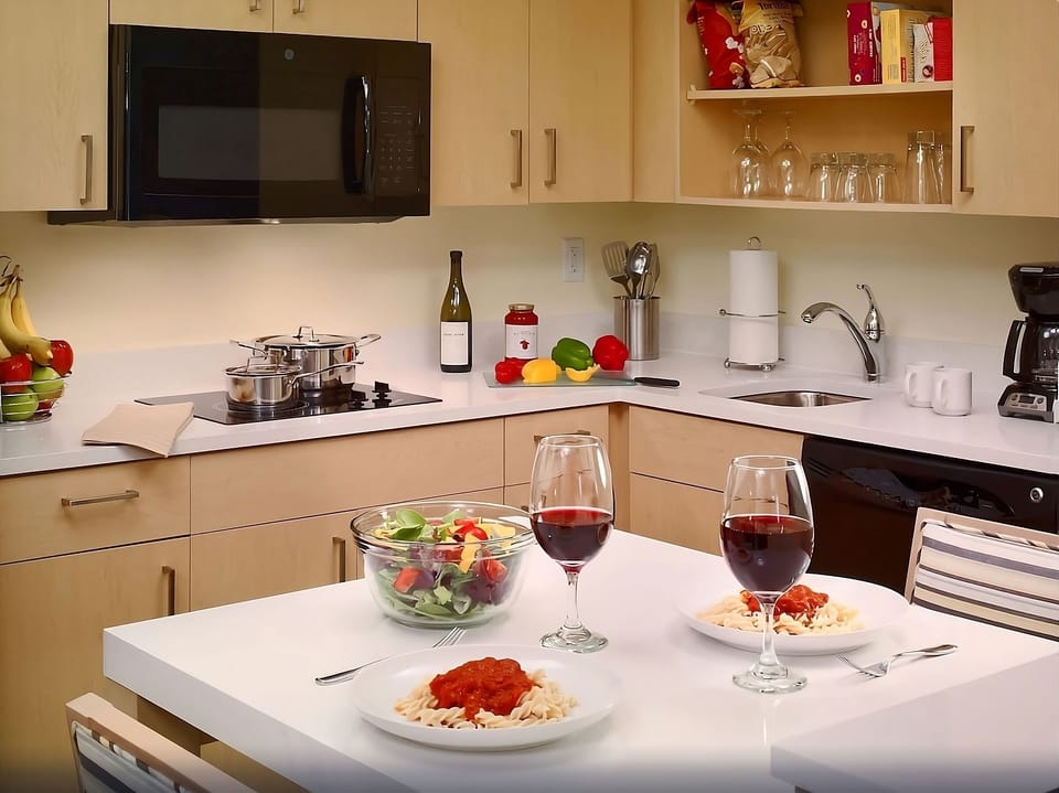 Plate up a warm meal and enjoy easy in-room dining.