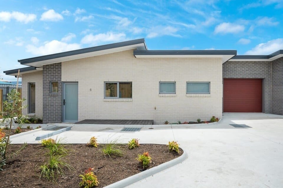 Newly built home with single lock up garage with electric roller door. Visitor parking also available.