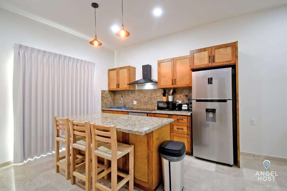 Have a seat at the breakfast bar to enjoy a bite to eat