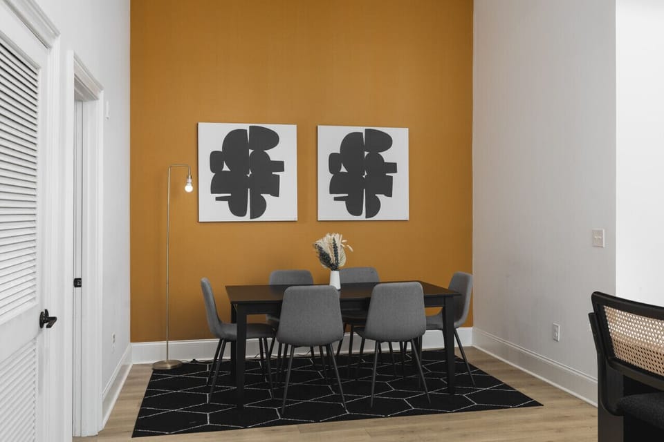 Dining room with seating for 6 off of the kitchen. Also a great spot for for getting work done - high-speed internet throughout the home.