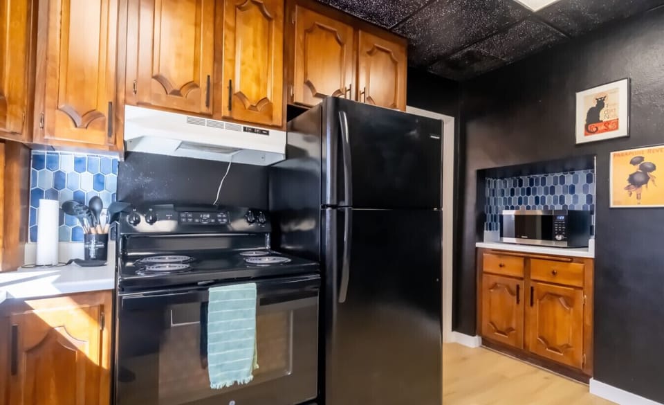 Warm kitchen with full appliances