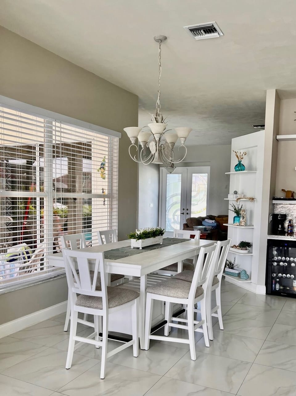 Dining room table seats 6 comfortably w/3 additional bar seats