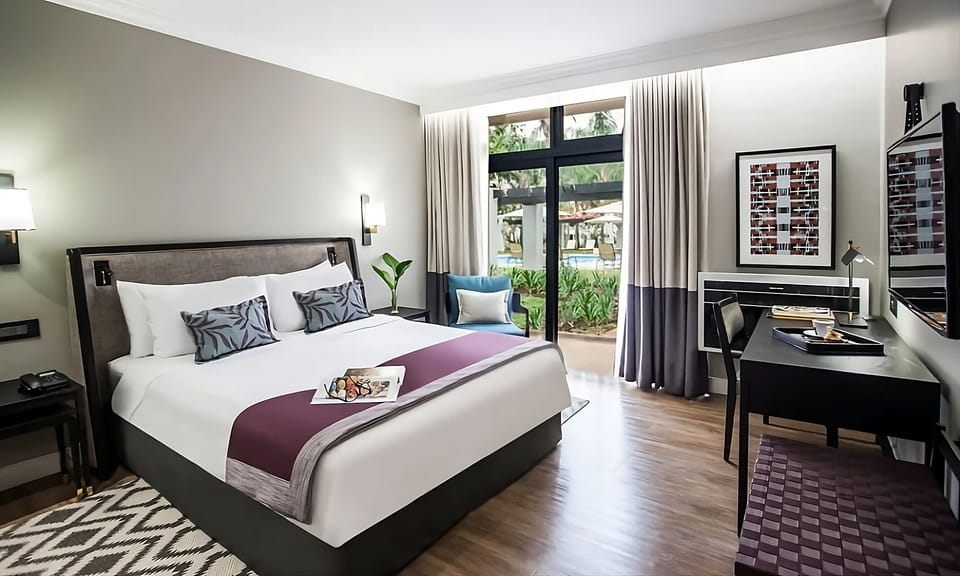 Wake to garden views from your serene, sunlit bedroom.