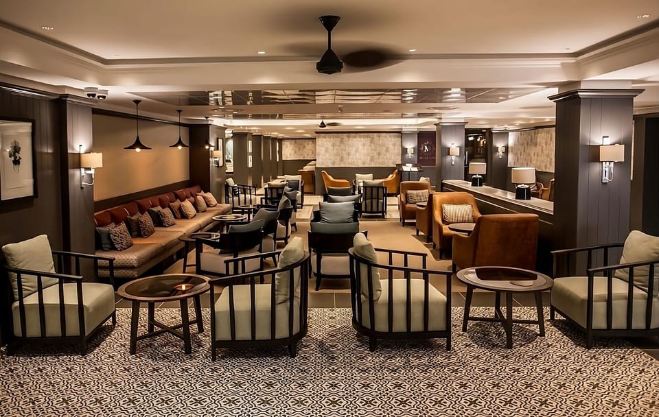 Gather comfortably in the spacious lounge with inviting sofas.