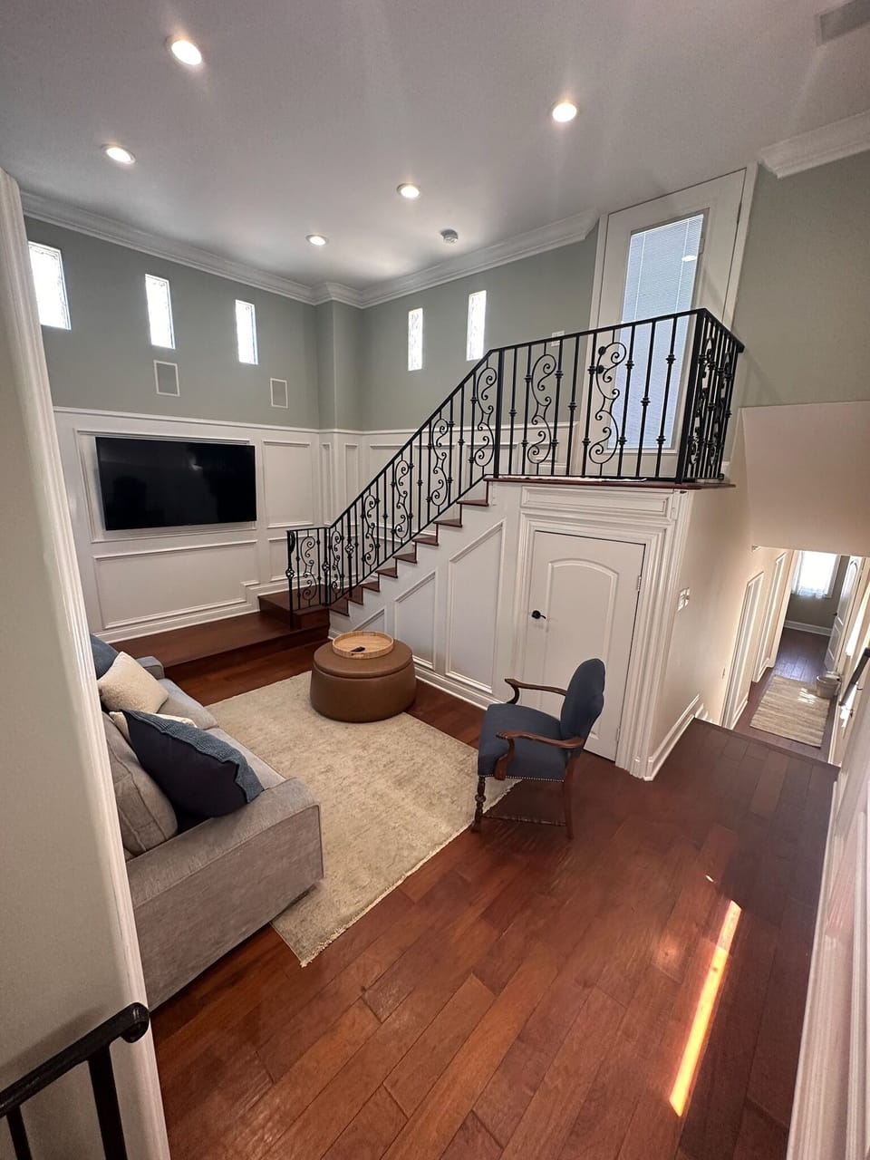 2nd floor TV room, and stairs to rooftop deck