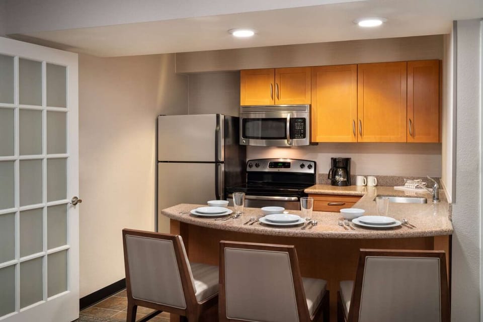 Cook easy meals in the bright, fully equipped kitchen.