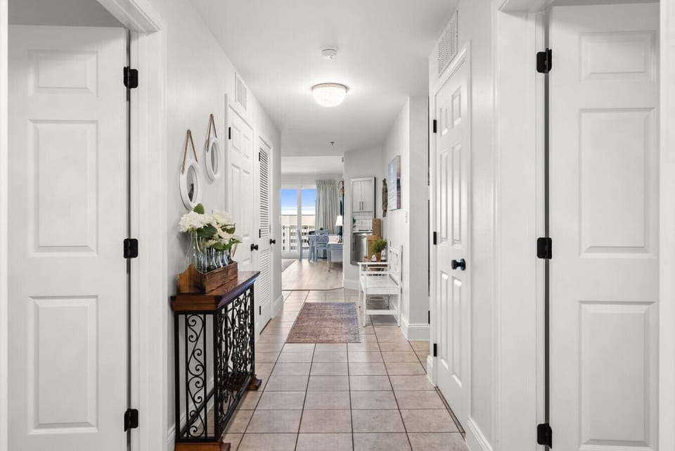 Bright, welcoming entry hallway leads you straight toward the open living space and beautiful views ahead.