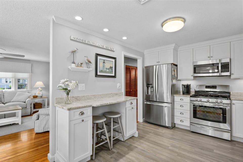 Breakfast bar area with seating for two to enjoy your morning coffee - 40 Willow Street West Harwich - Waves on Willow - NEVR