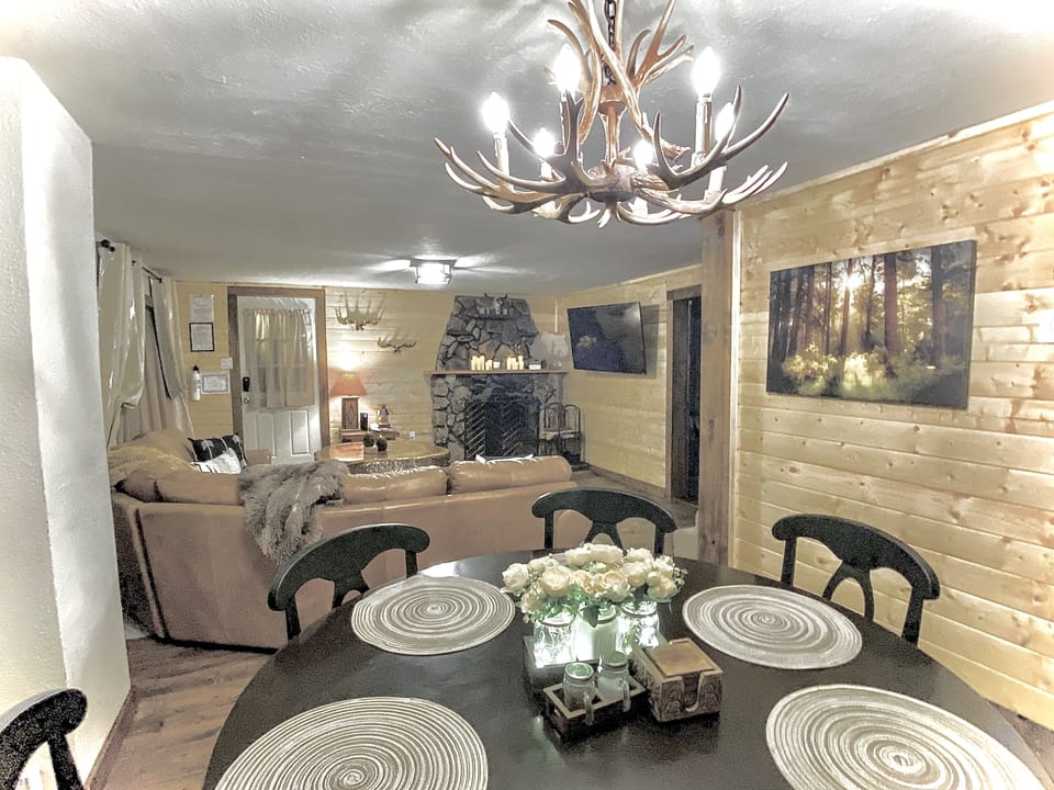 Open dining room with seating for six.