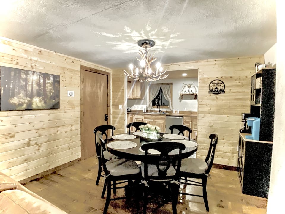 Dining room, space with a coffee/tea station hutch that includes many extras