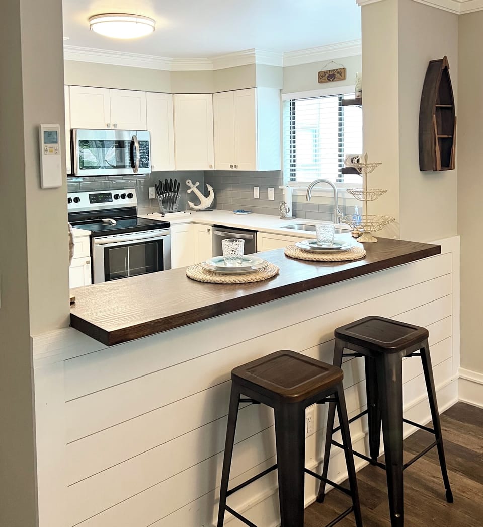 Start your day right at the kitchen island bar, sipping morning coffee