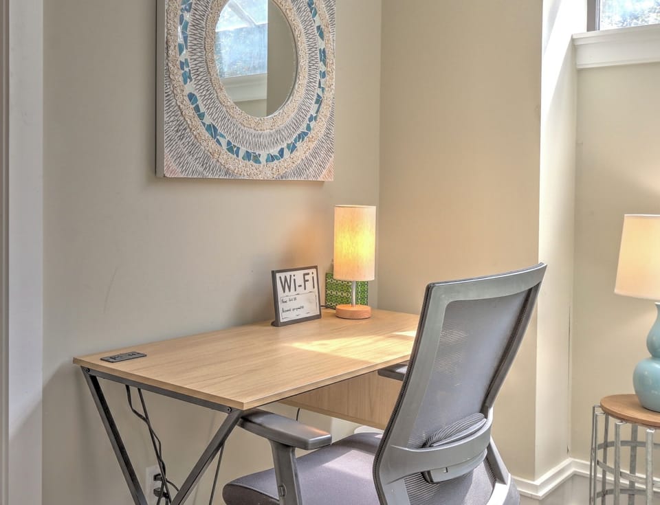 The desk in the first-floor master bedroom provides a convenient space to work