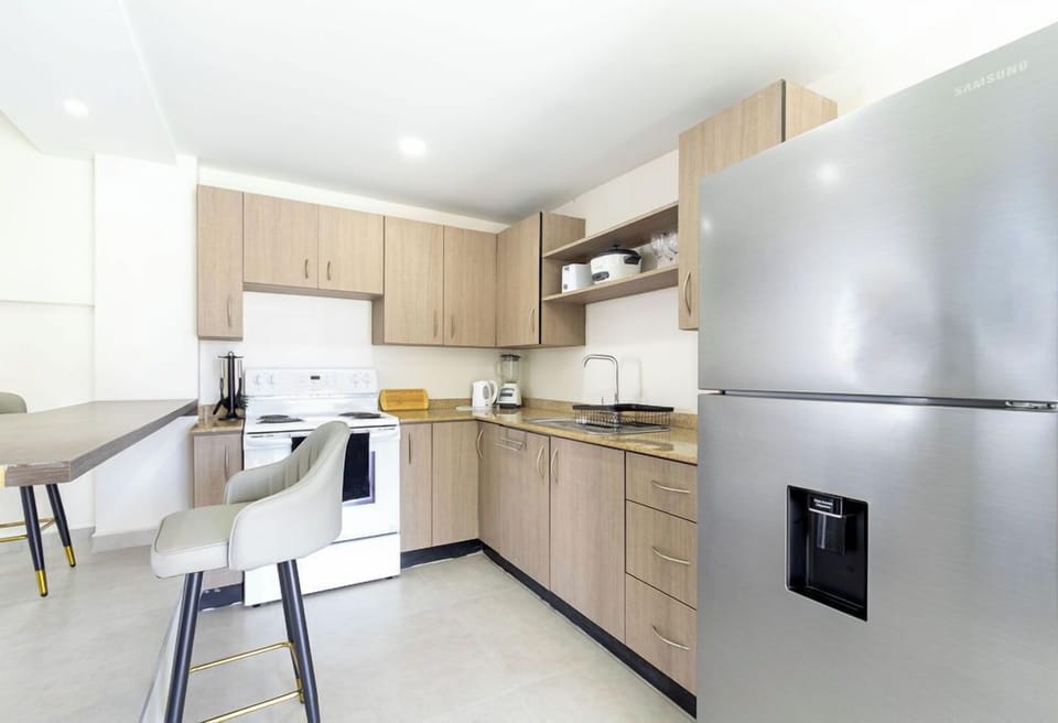 If you want to prepare more meals simultaneously, you can do so easily since the property features two additional kitchens in separate apartments.