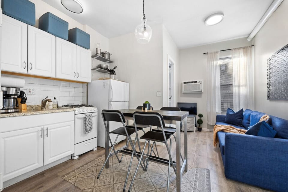 An open floor plan seamlessly connecting the kitchen, living area, and dining space.