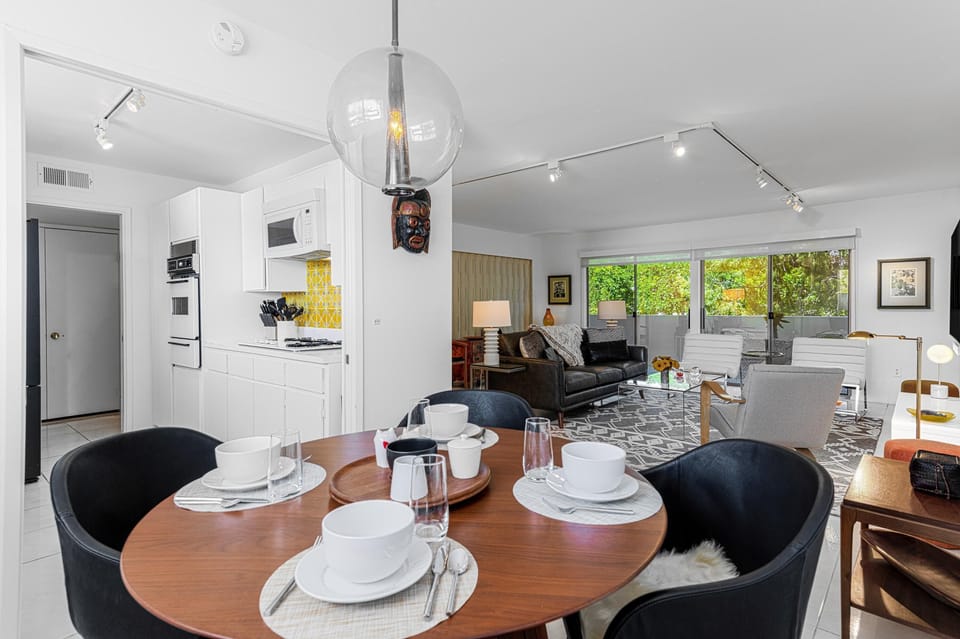View of living room, dining area and kitchen