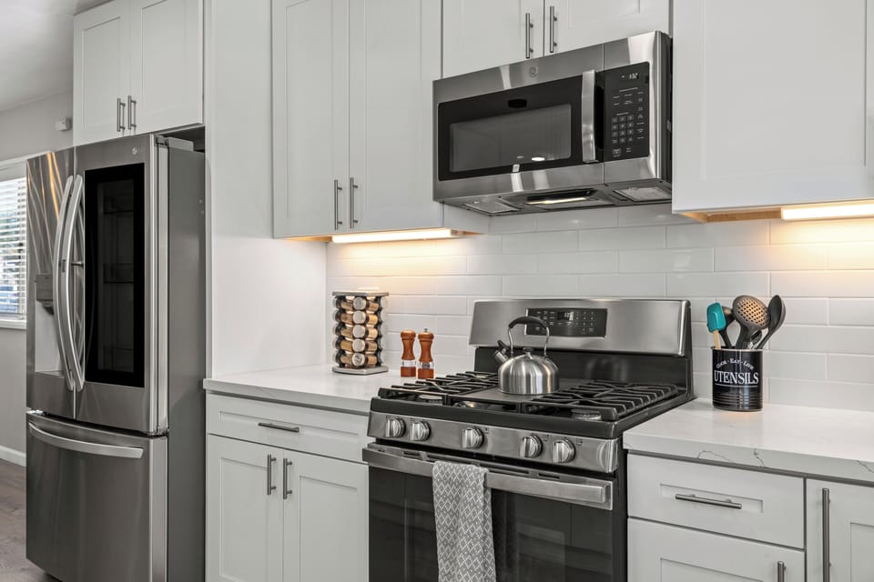 Modern design and bright finishes make this the heart of your vacation home