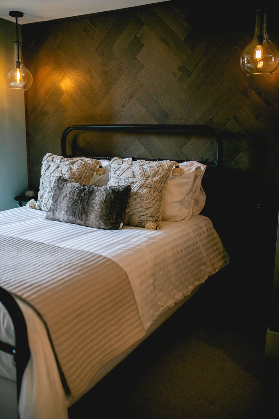 Relax in style on our Queen Bed, dressed in luxurious linens for a night of unmatched comfort and tranquility.