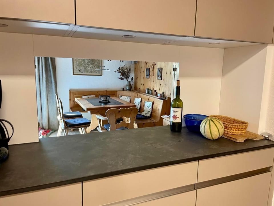 Kitchen with window which can be closed while cooking