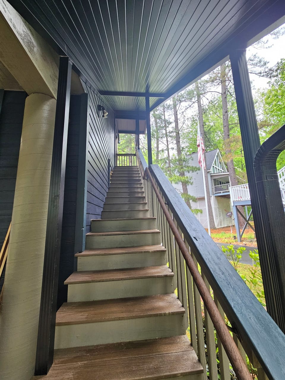 The steps upstairs to the front entrance are now covered! No getting wet.