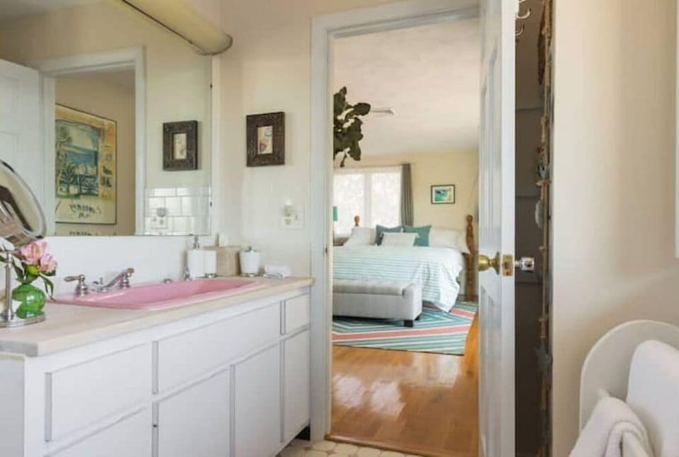 Master bathroom and view of California King bed