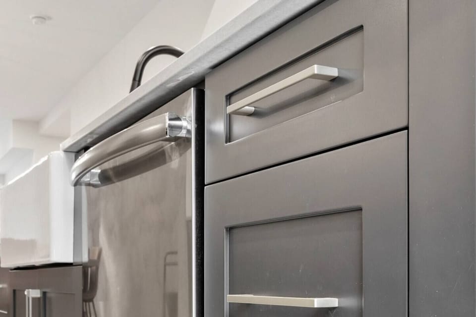Kitchen: A long centralized island, a great place to prepare your meals.
