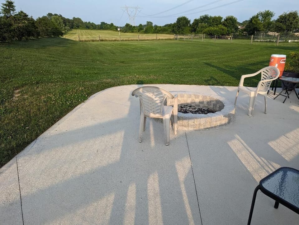 one of two fire pit patios.  This one is inside our 1/2 acre dog park