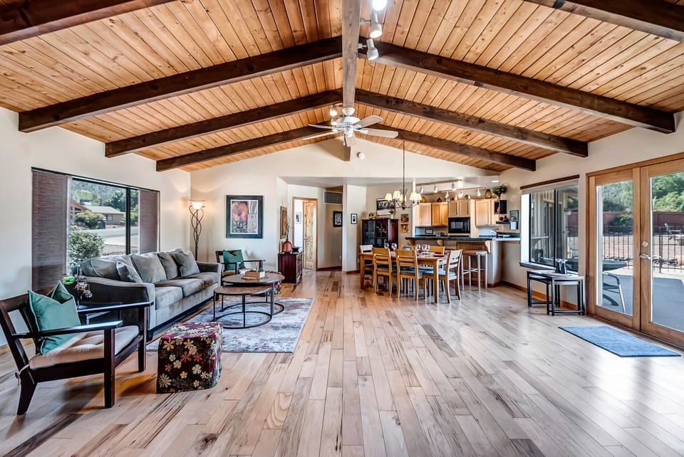 Spacious Living Room with Plenty of Comfortable seating and Smart TV