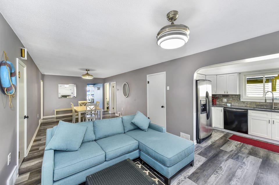 View from living room and kitchen with electronic gas fireplace