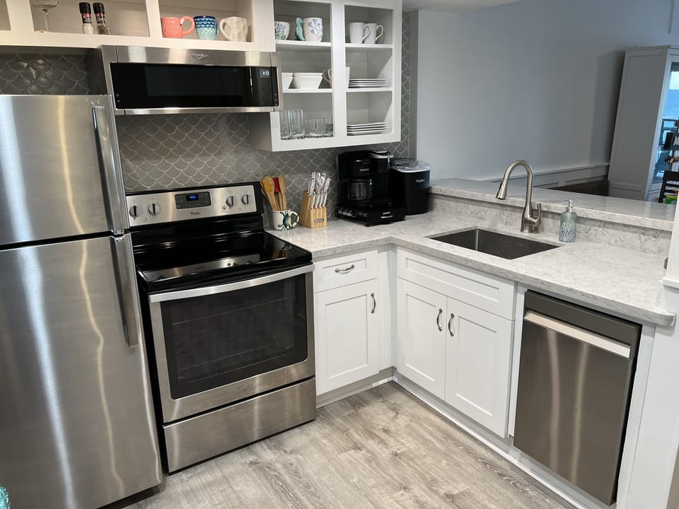 Well appointed kitchen for cooking or enjoying seaside meals.